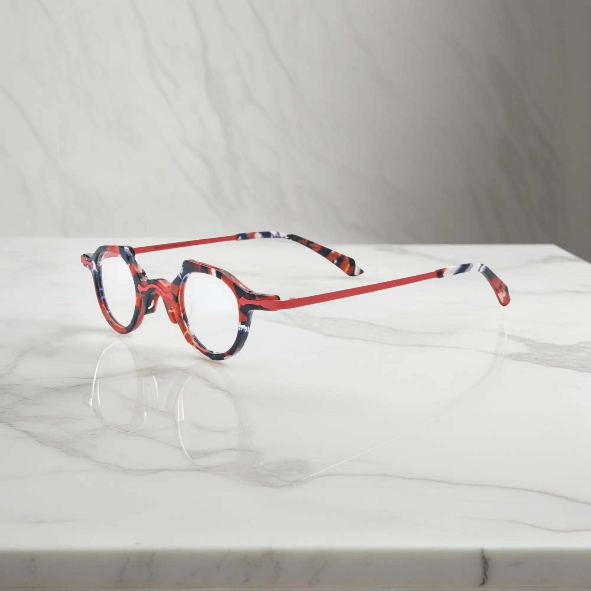 Side profile of the VL19341 ink black and red eyeglasses showing subtle transitions in color and high-quality hinge design.